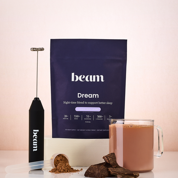 beam Dream product packaging with a glass of liquid and chocolate pieces